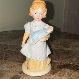 PorcelainAvon  Figurine of Young Woman  Holding Baby-  A Mother’s  Love 1981